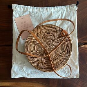 Amerii brand handmade ata woven bag with leather strap.